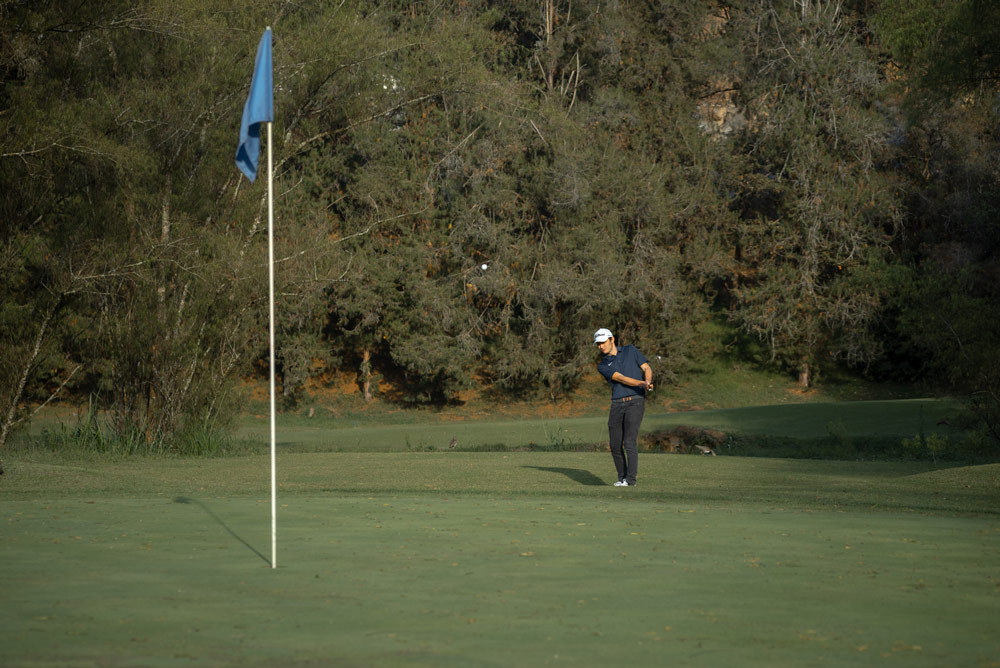 Golfer with Flag